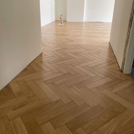 Light oak herringbone hallway flooring